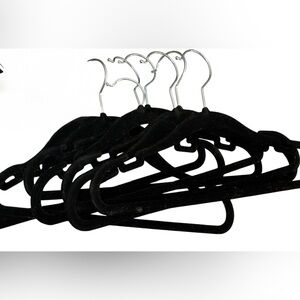 10 children's black velvet hangers and like new condition.